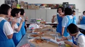 The members were having their pizzas.